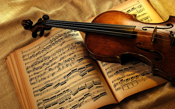Instrumento-musical-sobre-notas-de-bellas-canciones-